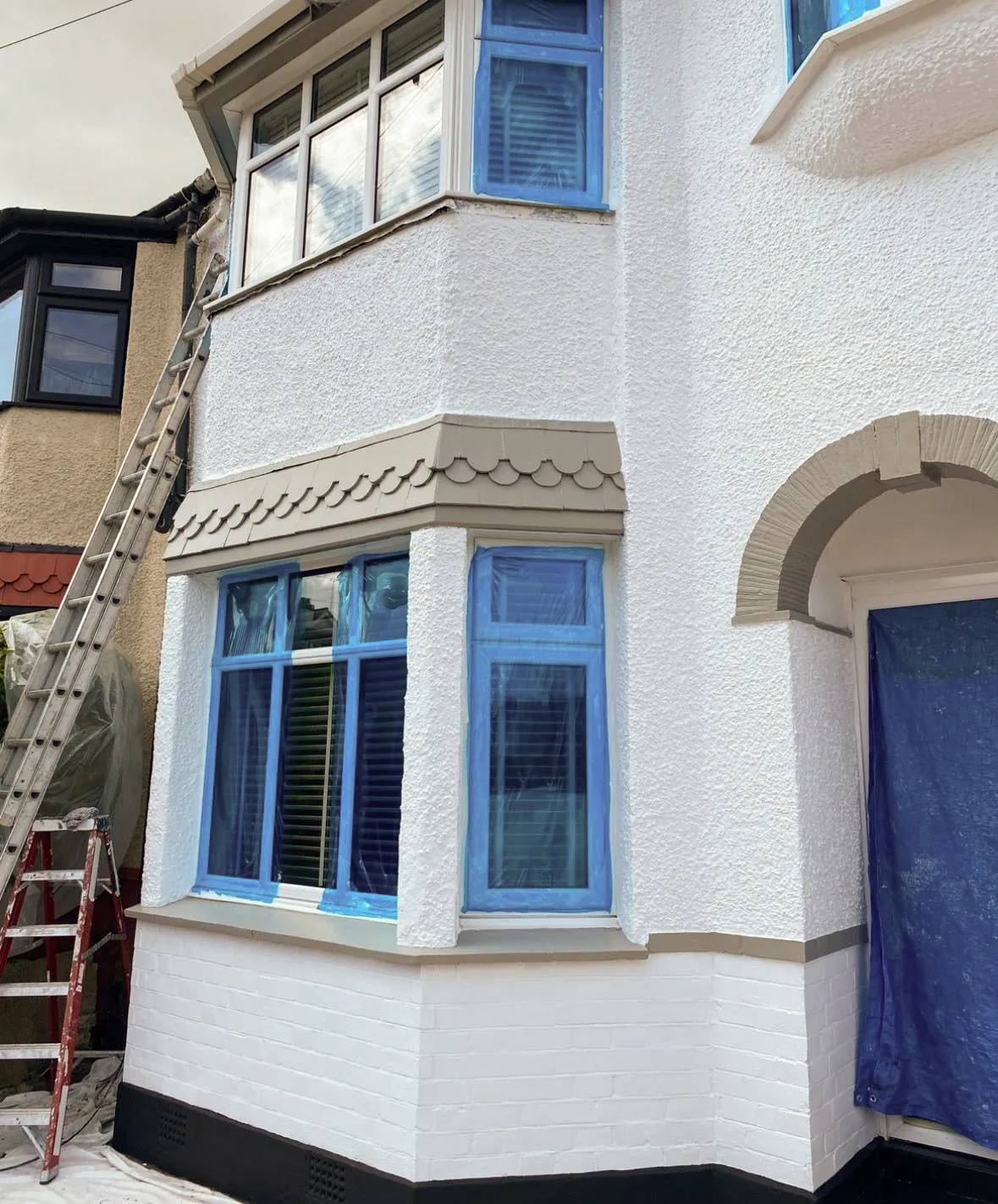 Exterior house painting and white masonry finish in Basildon